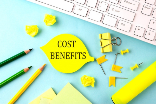 cost benefits written on a leaf-shaped sticky note