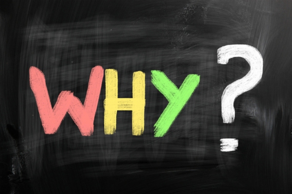 WHY written using different colored chalks on chalkboard depicting Uneven Temperatures at home