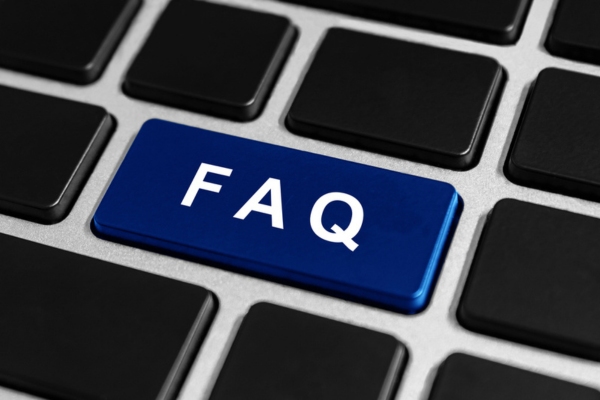 FAQ on keyboard key depicting questions about ductless air conditioning historic home
