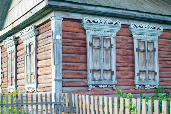 Wooden shutters on an old wooden house