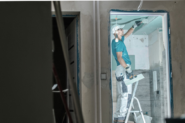 image of a man remodeling a home
