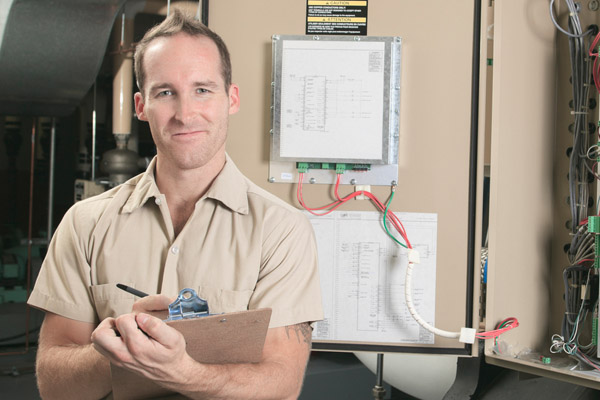 image of an HVAC contractor providing a consultation