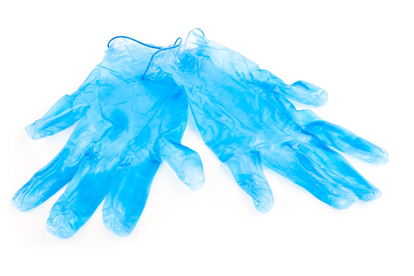 image of disposable gloves that were used to remove rodent from air duct