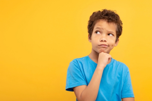 image of a kid thinking wondering if ductless AC is right for your home