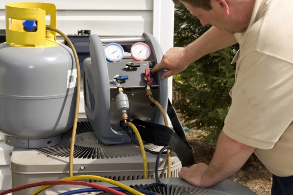 HVAC technician performing AC tune-up