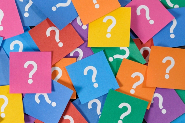question marks on colored papers depicting HVAC Allergies FAQs