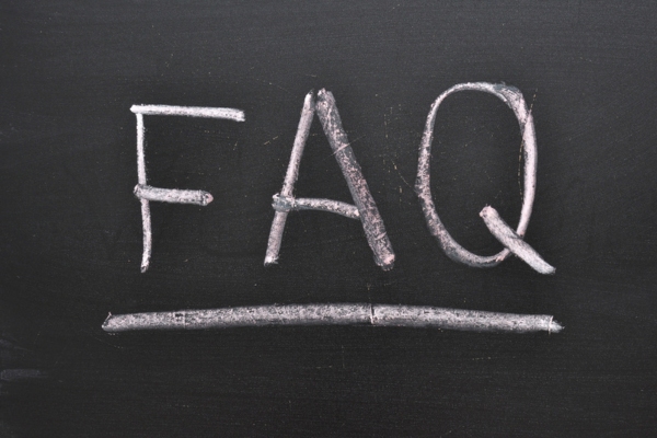 FAQ written on chalkboard depicting questions about Air Conditioner Won't Turn On