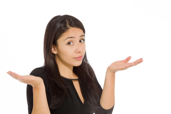 woman shrugging depicting How Modern High-Efficiency Heating Systems Operate