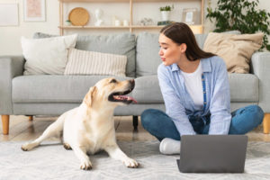 image of homeowner and dog depicting air quality in winter