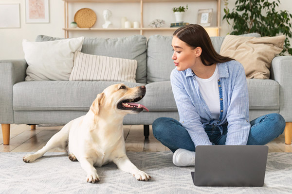 image of homeowner and dog depicting air quality in winter