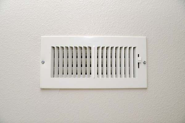 air conditioning vent with ac unit that is blowing smoke