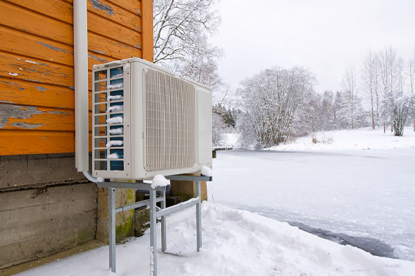 image of outdoor heat pump unit in defrost cycle