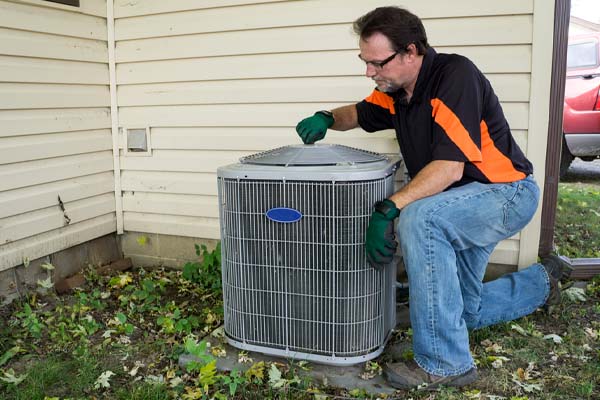 image of an air conditioner compressor repair