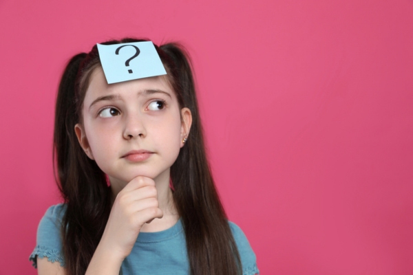 question mark on a sticky note on a kid's forehead depicting Why Is My House So Humid