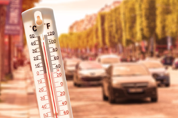 thermometer depicting high summer temperatures and heat pump operation