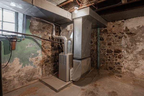 image of an old furnace depicting pilot light problems