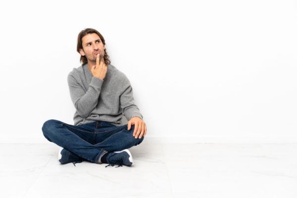 man thinking while sitting on the floor depicting What To Do If the Gauge Is Broken