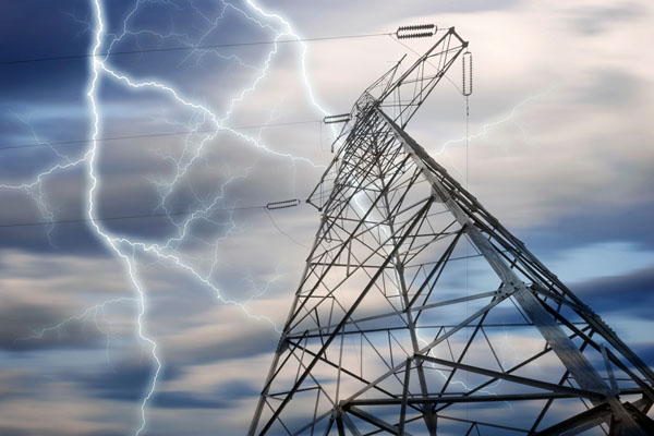 image of lightening storm hitting electric cables depicting power surges and heating cooling