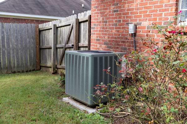 image of an outdoor air conditioning unit that has frozen ac coil