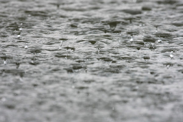 image of rain depicting condensation and impact on outdoor ac unit