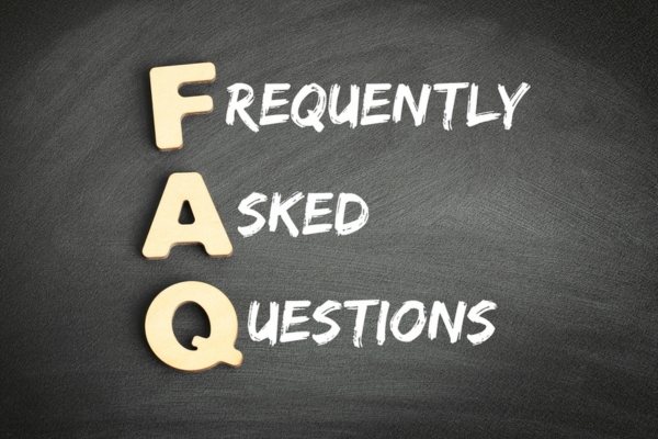 Frequently Asked Questions written on a chalkboard depicting FAQs about energy-efficient air conditioner