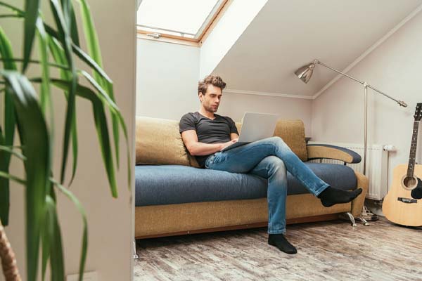 image of a teenager in an attic room and air conditioning