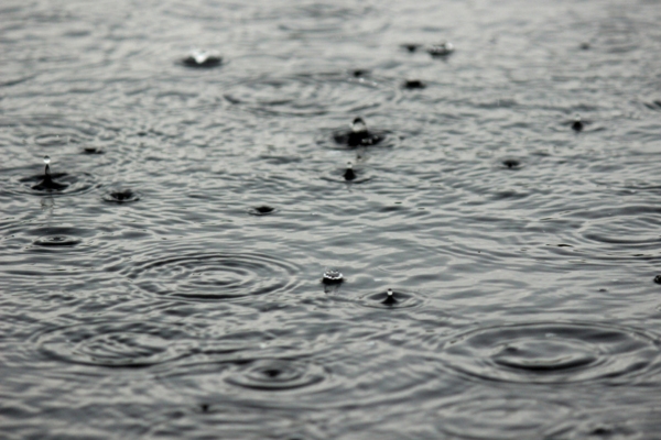 image of raindrops depicting condensation and impact on outdoor ac unit