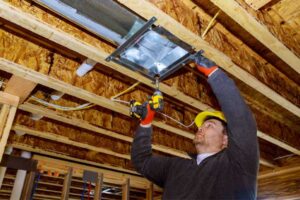 image of an hvac contractor performing hvac ductwork installation