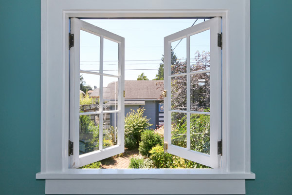 image of an open window depicting natural ventilation