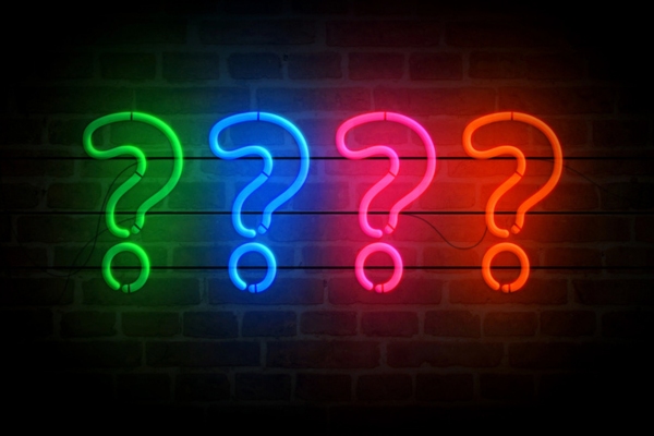 neon lights forming question marks depicting Comfort Air Conditioner