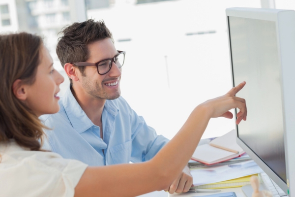 couple researching about the ideal cooling system for the house