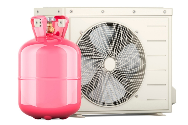AC refrigerant tank in front of a condenser