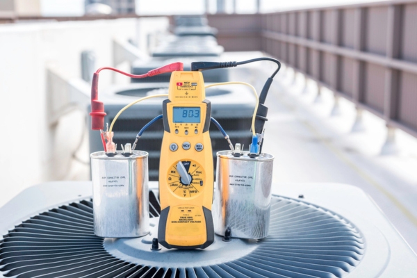 air conditioner capacitors being tested