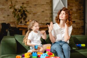 mother and daughter feeling hot indoors due to AC not working properly