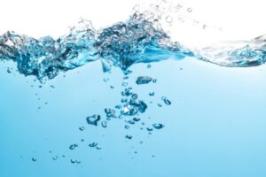 splash of water depicting water in heating oil tank
