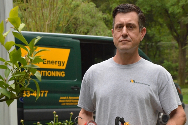 McAllister Energy HVAC technician and service van
