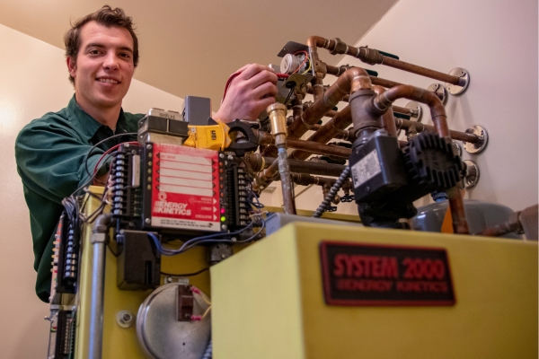 McAllister Energy HVAC technician tending to a boiler system
