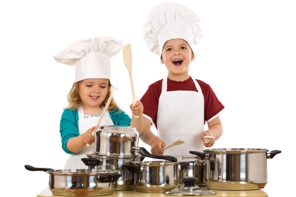 kids dressed as chefs banging pots and pans depicting furnace banging sounds