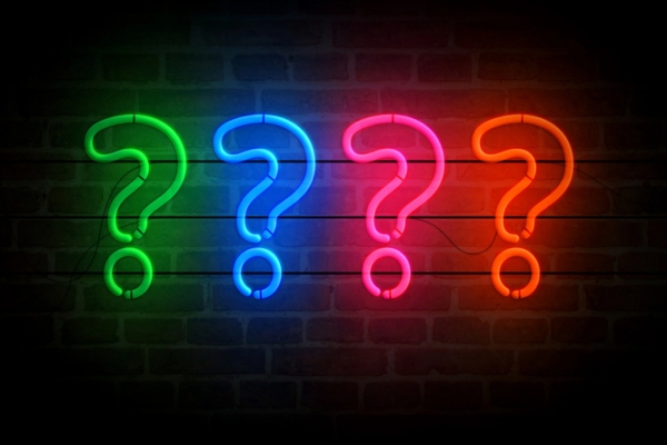 question marks using neon lights depicting Whole-House Generator Safety Tips FAQs