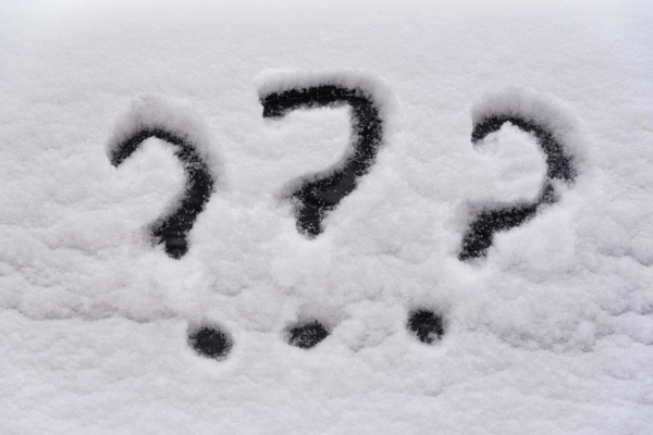 question marks doodled on snow surface depicting Generator in Snow FAQs