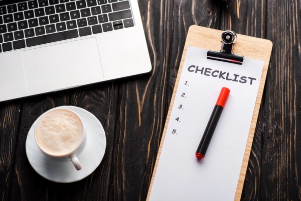 CHECKLIST on a clipboard depicting Key Factors to Review When Selecting a Community Supplier