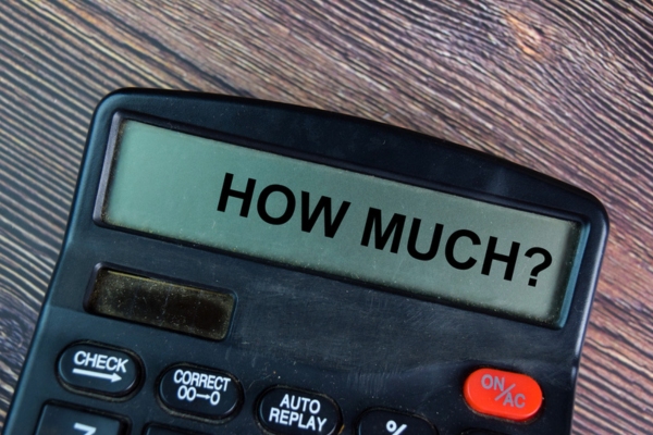 HOW MUCH written on a calculator screen depicting HVAC System Installation Cost