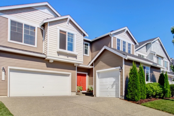 big house exterior with garage and driveway