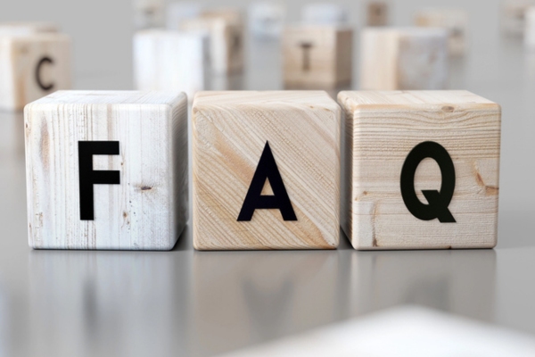 FAQ spelled using wooden letter cubes depicting Cooling System Installation questions