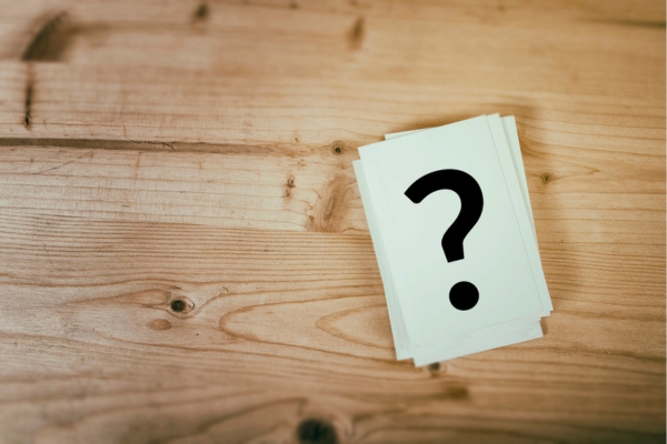 question mark on a stack of paper depicting HVAC Air Filter Replacement