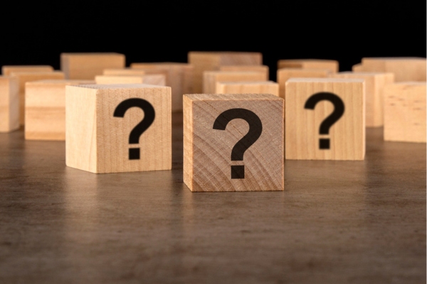 question marks on wooden cubes depicting Trusted Heating Oil FAQs